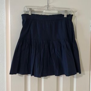Anthropologie navy pleated mini skirt size small